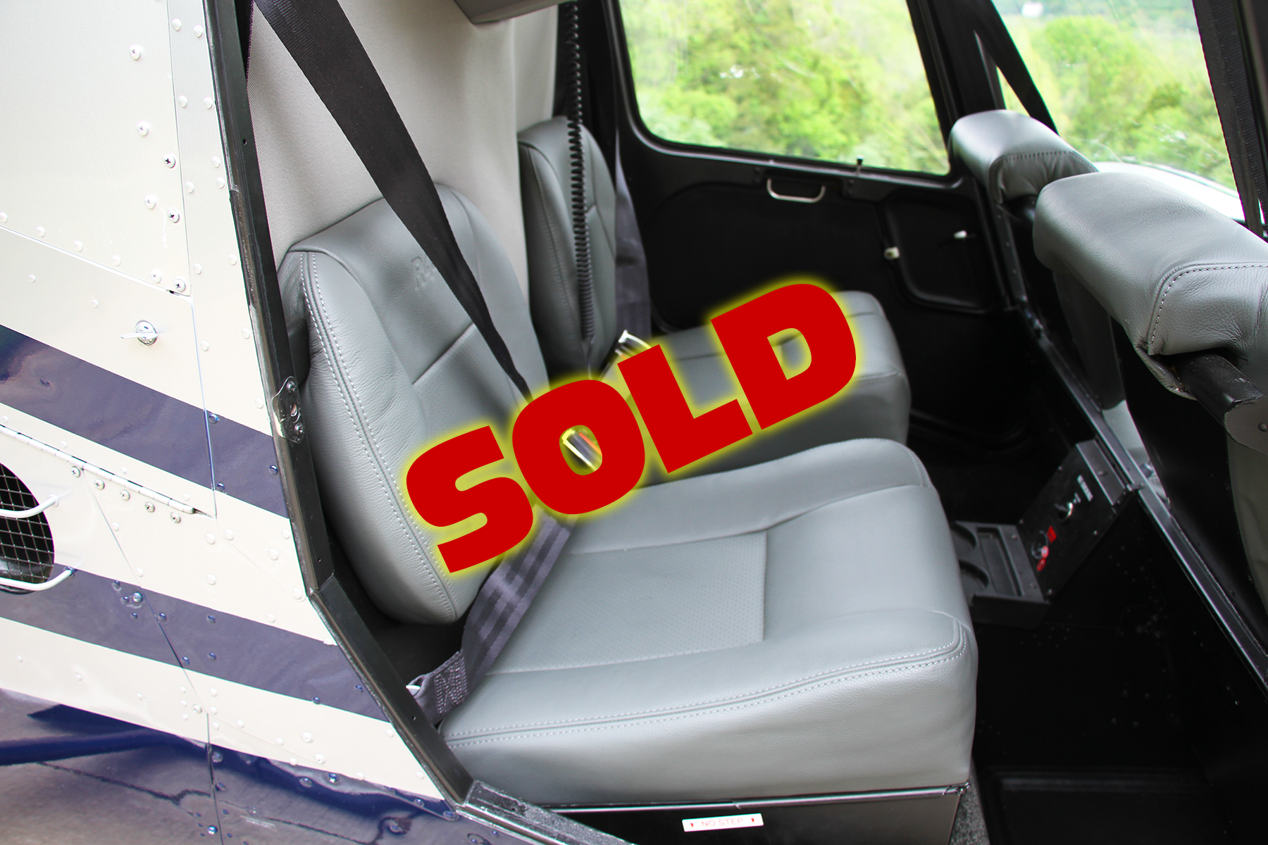 cabin photo of Robinson R44 N186TC leather interior